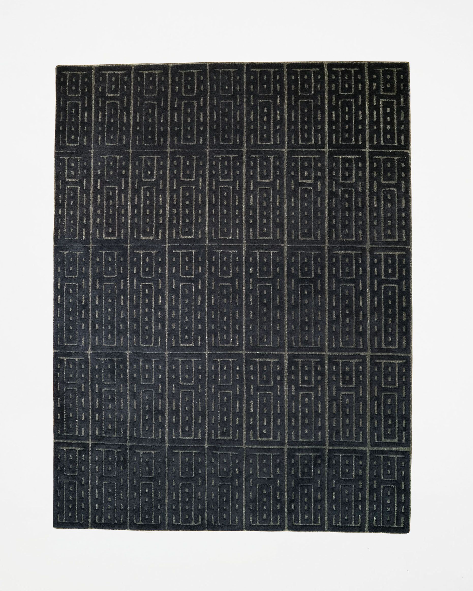 hein-studio-leonora-tapis-laine-202x284-noir-marron image 1