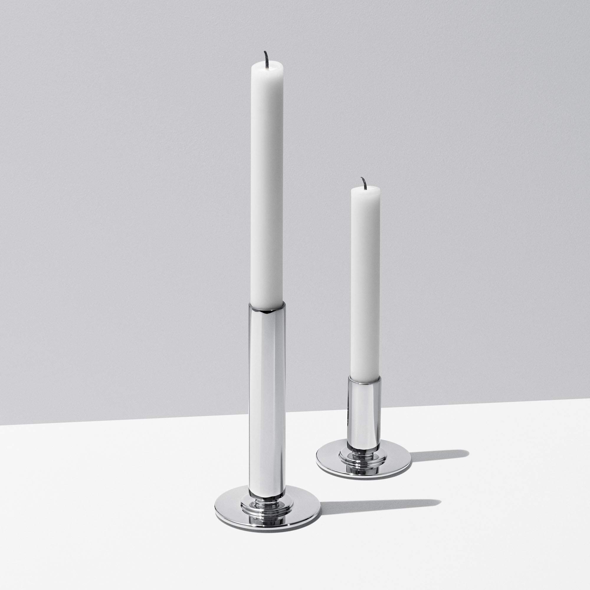 georg-jensen-manhattan-paire-bougeoirs-inox-petit-grand image 3
